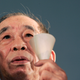 Hong Kong pro-democracy activist Szeto Wah takes part in a candlelight vigil at Hong Kong's Victoria Park, June 4, 2007 to mark the 18th anniversary of the military crackdown on a pro-democracy movement at Beijing's Tiananmen Square in 1989.